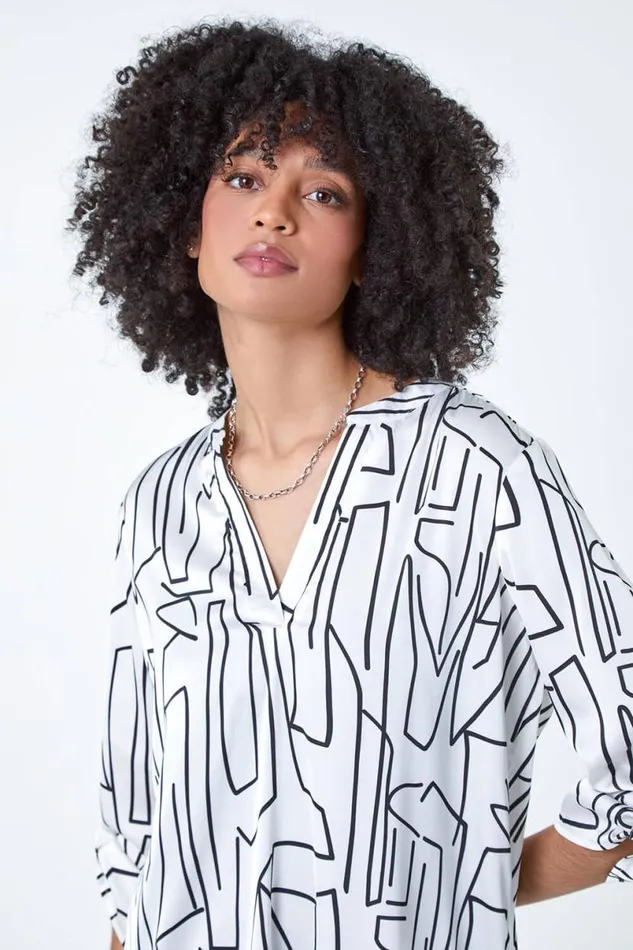 Ivory Abstract Print Longline VNeck Top Women Roman Tops