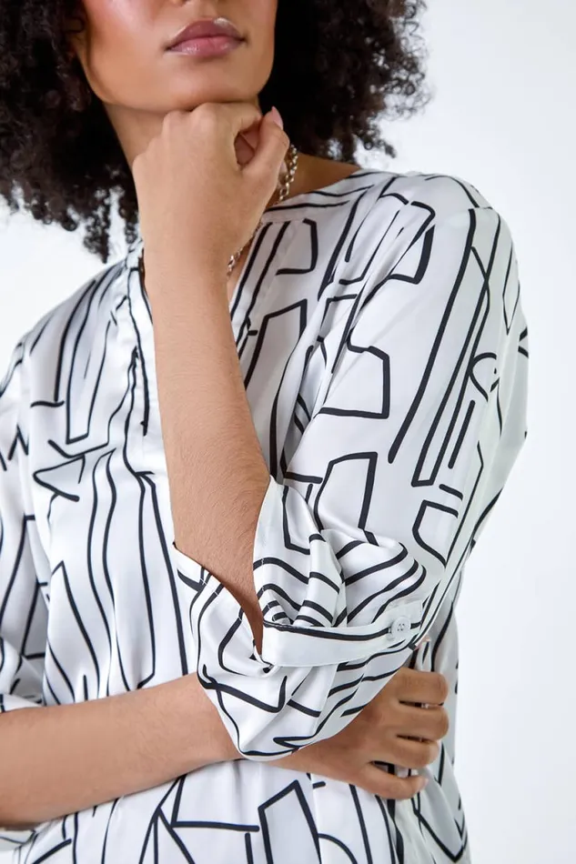 Ivory Abstract Print Longline VNeck Top Women Roman Tops