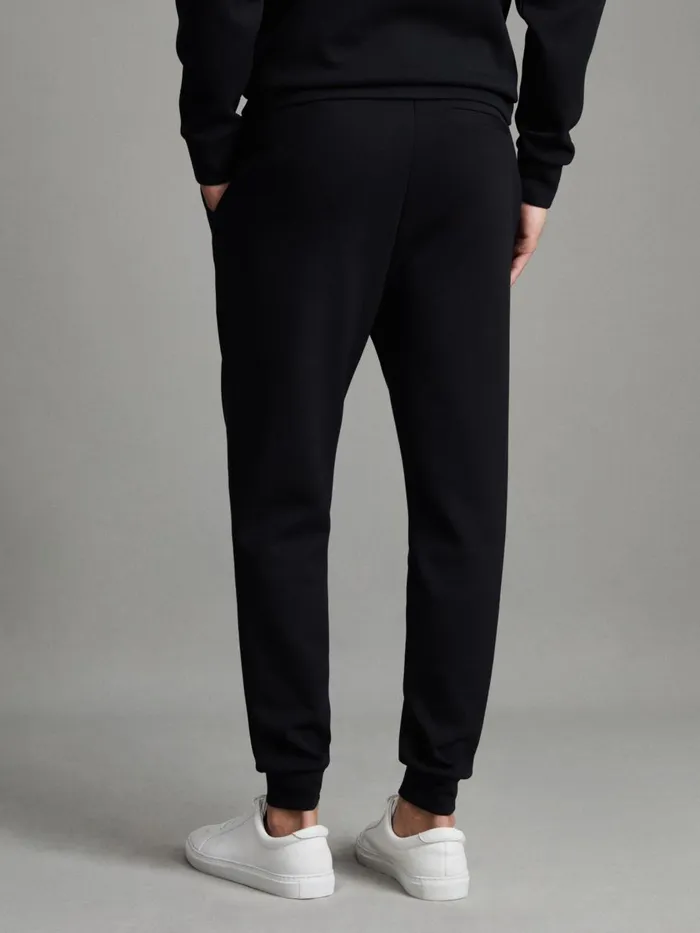 Men Reiss Sweats Hoodies and Joggers Premier Interlock Jersey Drawstring Joggers Navy