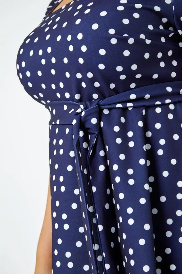Navy Curve Stretch Polka Dot Peplum Top Women Roman Tops